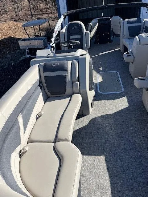 Slide: The Image of 2023 Barletta Cabrio 22CC boat interior with plush seating and modern design. - 3