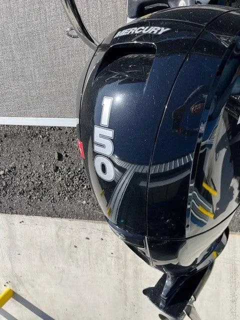 Slide: The Image of Mercury 150 horsepower outboard motor on a 2023 Barletta Cabrio 22UC boat. - 10