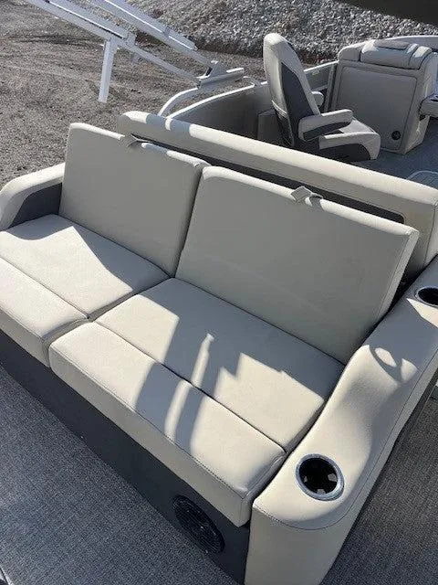 Slide: The Image of 2023 Barletta Cabrio 22UC boat seating with cup holders, beige upholstery. - 8