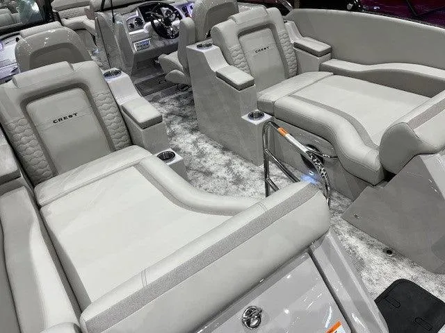 Slide: The Image of 2024 Crest Continental 250 SLRC boat interior with luxurious seating and modern design. - 3