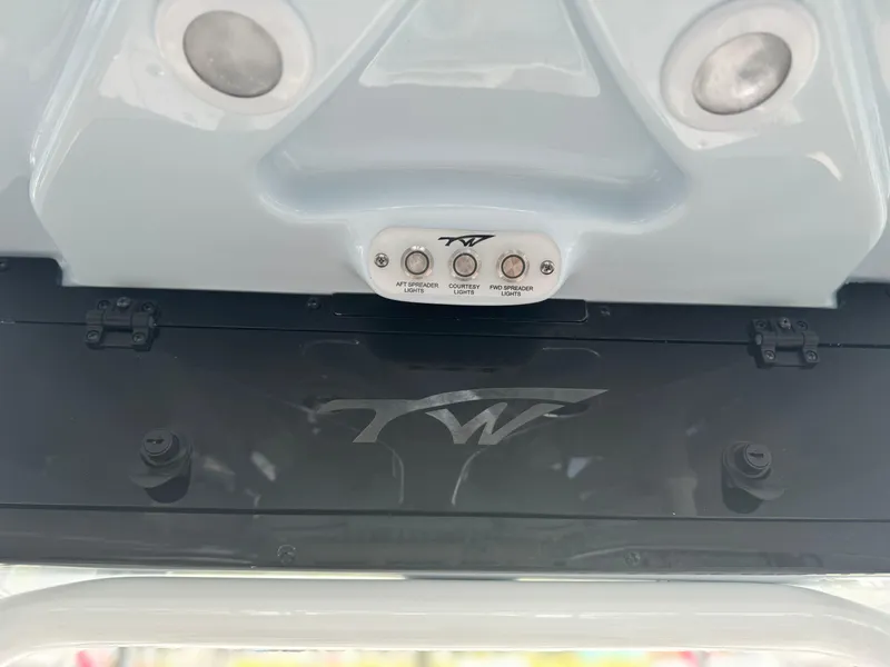 Slide: The Image of 2025 Tidewater 2110 Bay Max boat controls and lighting panel. - 10