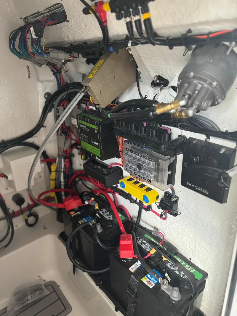 Slide: The Image of Electrical system of 2025 Tidewater 2110 Bay Max boat, featuring batteries and wiring. - 11