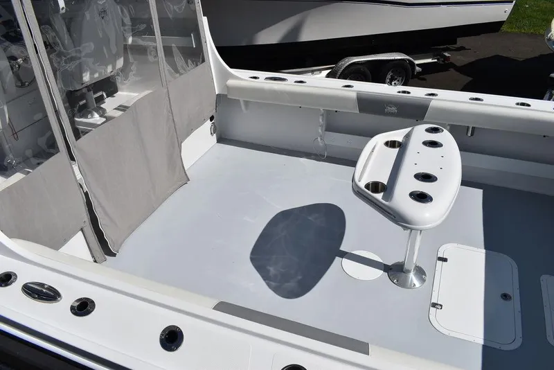 Slide: The Image of 2023 Steiger Craft 31 Miami boat deck with fishing rod holders. - 25