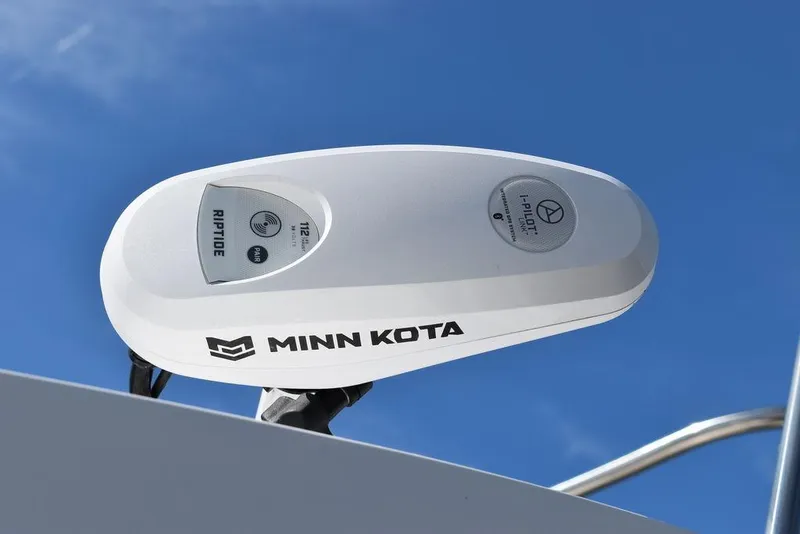 Slide: The Image of Minn Kota motor on 2023 Steiger Craft 31 Miami boat against blue sky. - 29