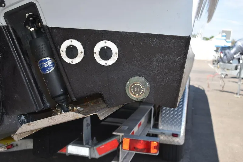 Slide: The Image of 2023 Steiger Craft 31 Miami boat on trailer, showing rear hull details. - 34