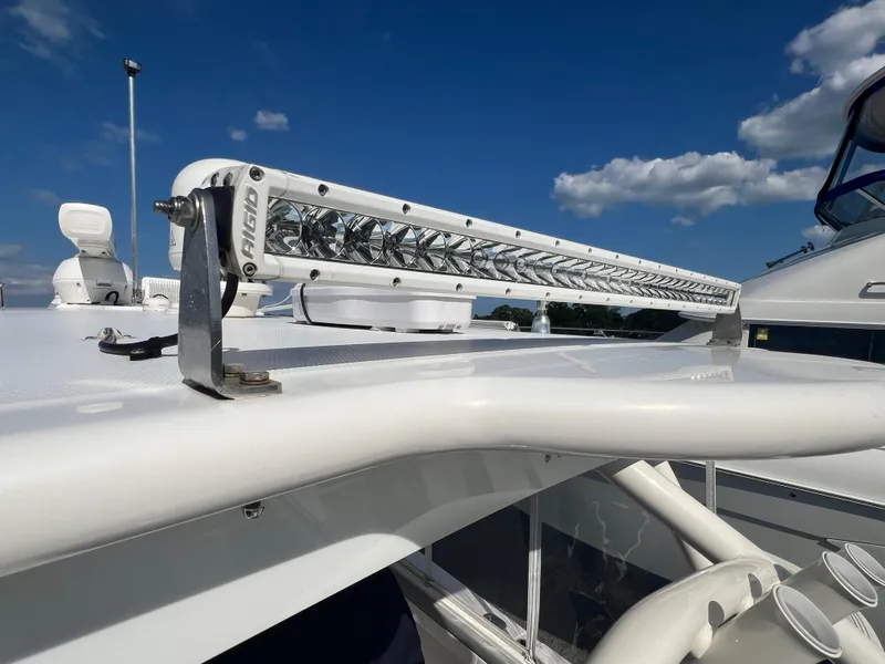 Slide: The Image of 2019 Regulator 41 boat with mounted LED light bar under clear blue sky. - 23