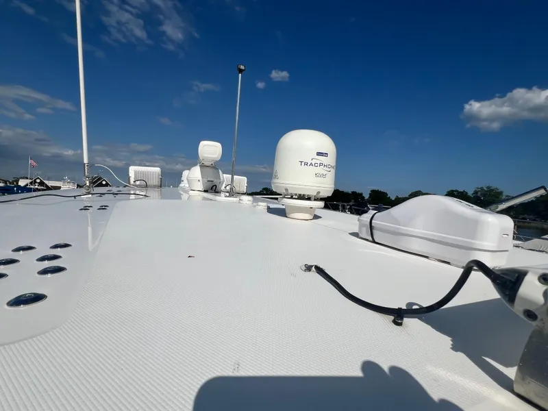 Slide: The Image of 2019 Regulator 41 boat deck with radar and clear blue sky. - 24