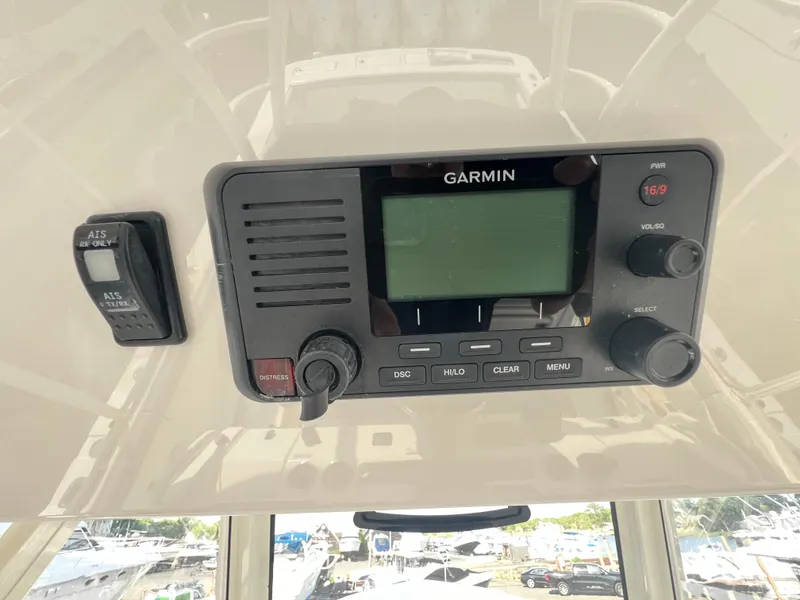 Slide: The Image of Garmin marine radio on 2019 Regulator 41 boat dashboard. - 36