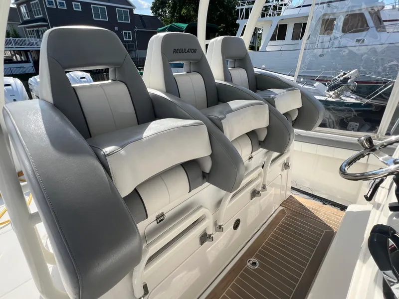 Slide: The Image of 2019 Regulator 41 boat with luxurious seating and modern helm design. - 46