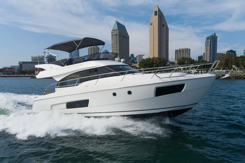 Slide: The Image of 2025 Bavaria Virtess 420 Fly yacht cruising near city skyline. - 14