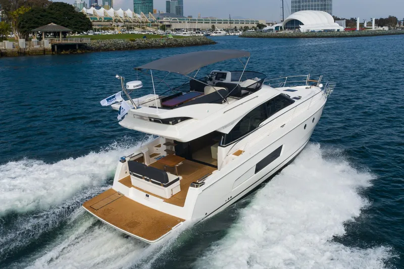 Slide: The Image of 2025 Bavaria Virtess 420 Fly yacht cruising on open water. - 16
