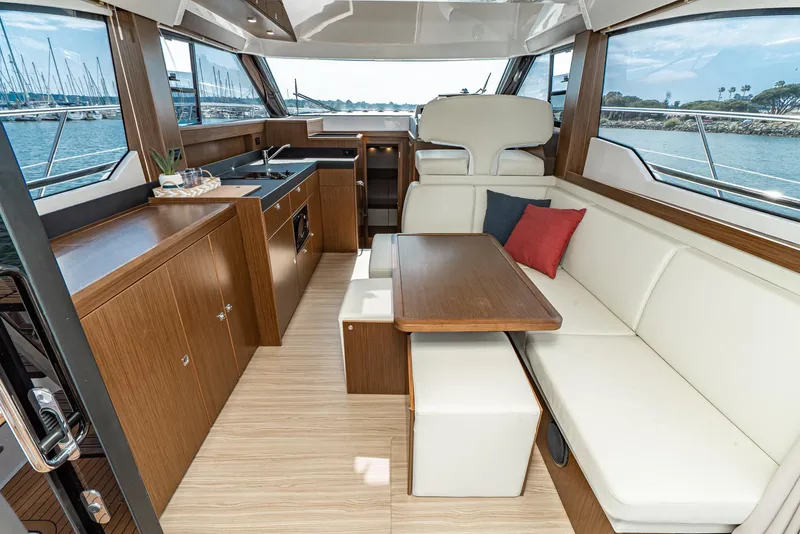 Slide: The Image of Luxurious interior of 2025 Bavaria Virtess 420 Fly yacht with modern kitchen and seating area. - 47