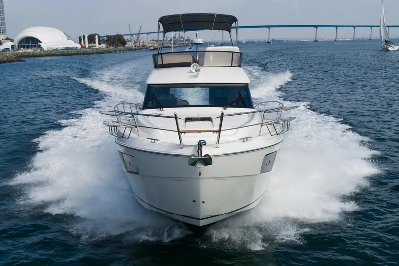Slide: The Image of 2025 Bavaria Virtess 420 Fly yacht cruising on open water. - 8