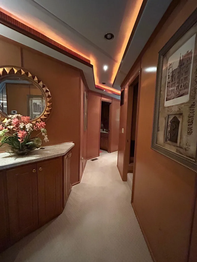Slide: The Image of Luxurious 2004 Fantasy houseboat interior with elegant wood paneling and decorative lighting. - 12