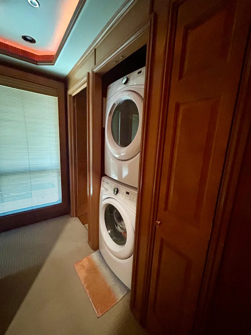 Slide: The Image of Stacked washer and dryer in a 2004 Fantasy Houseboat interior. - 17