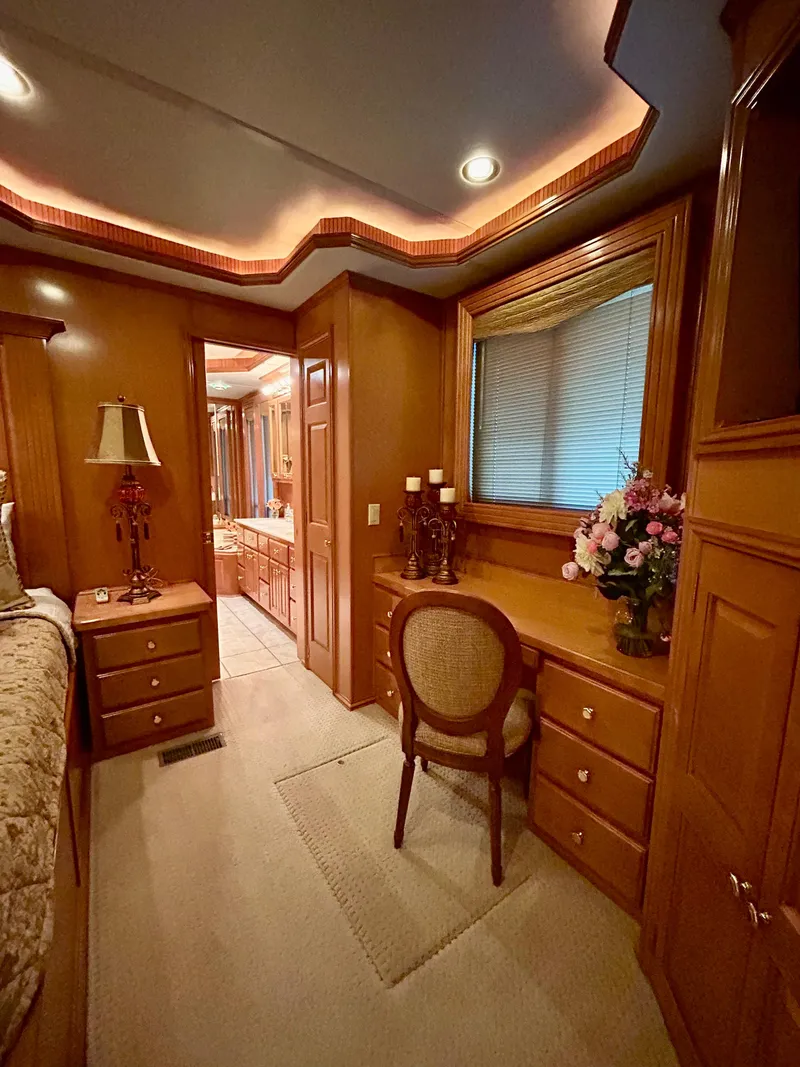 Slide: The Image of Luxurious 2004 Fantasy houseboat interior with elegant wood furnishings and ambient lighting. - 27