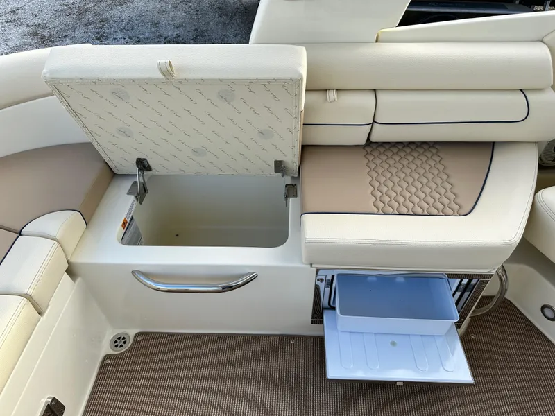 Slide: The Image of 2025 Chris-Craft Launch 28 GT interior seating with storage compartments open. - 10