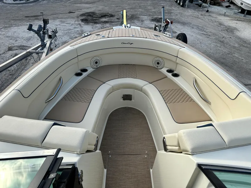 Slide: The Image of 2025 Chris-Craft Launch 28 GT boat interior with beige seating and elegant design. - 21