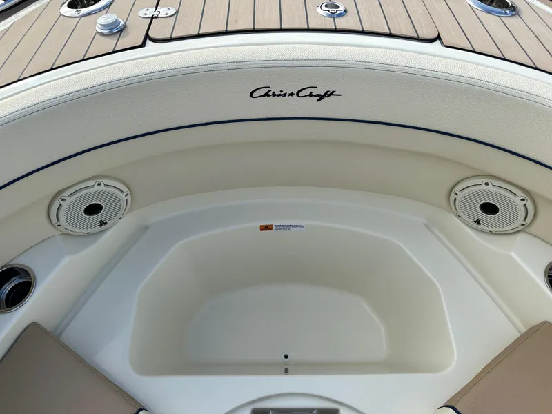 Slide: The Image of 2025 Chris-Craft Launch 28 GT boat interior with speakers and elegant design. - 28