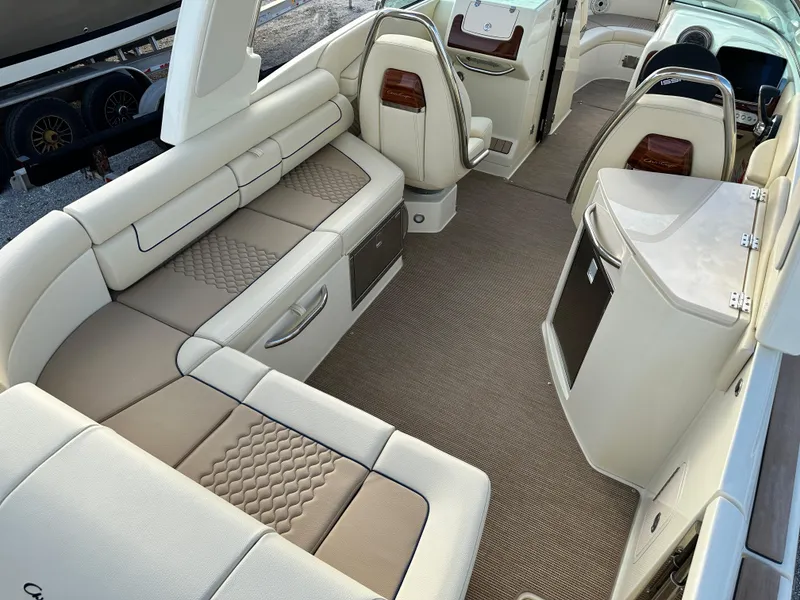 Slide: The Image of 2025 Chris-Craft Launch 28 GT interior with luxurious seating and modern design. - 8