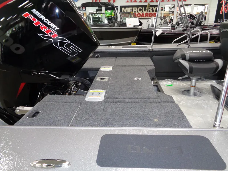Slide: The Image of 2025 Lund 1875 Pro-V Sport boat interior with Mercury Pro XS engine. - 17