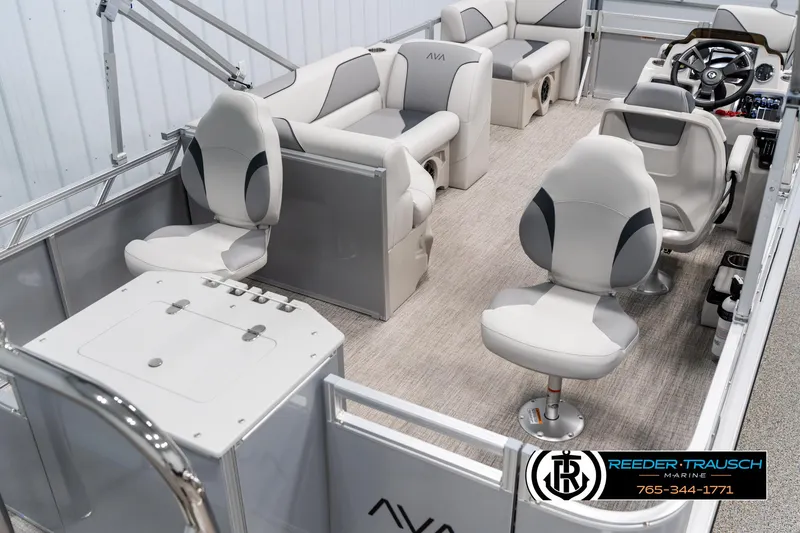 Slide: The Image of Luxurious 2025 Avalon VEN RF pontoon boat interior with plush seating and modern helm. - 12