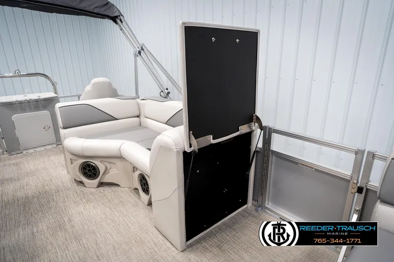 Slide: The Image of 2025 Avalon VEN RF boat interior with plush seating and modern design. - 21