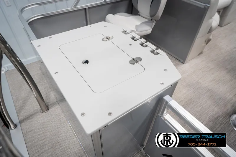 Slide: The Image of 2025 Avalon VEN RF boat interior with seating and storage compartment. - 26