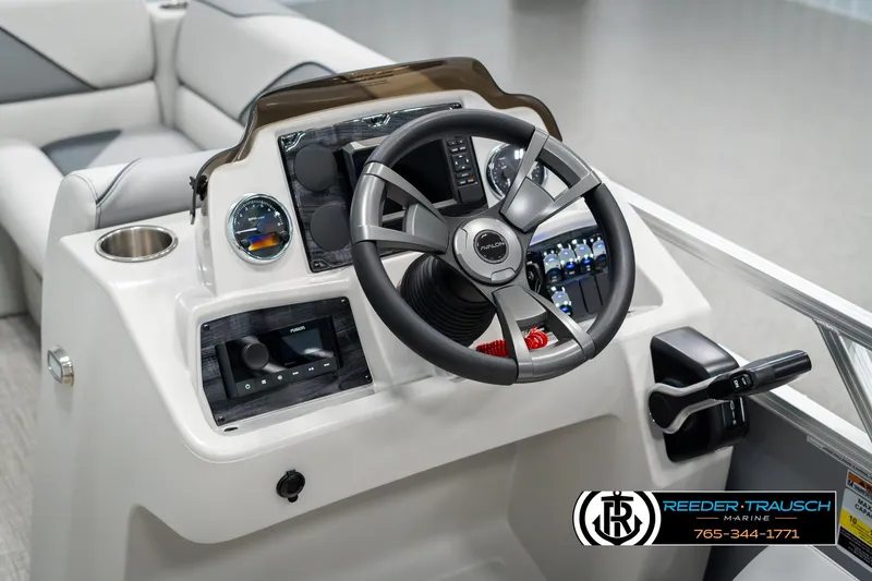 Slide: The Image of Steering console of 2025 Avalon VEN RF boat with modern controls and dashboard. - 29