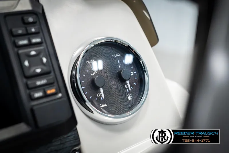 Slide: The Image of Close-up of 2025 Avalon VEN RF dashboard with trim and fuel gauges. - 34