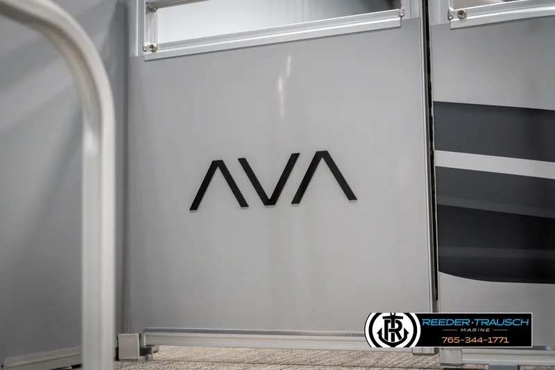 Slide: The Image of 2025 Avalon VEN RF boat door with AVA logo and Reeder-Trausch Marine branding. - 49