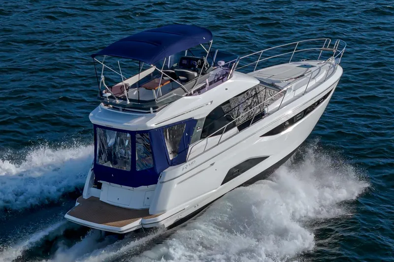 Slide: The Image of 2024 Bavaria R40 yacht cruising on open water. - 15