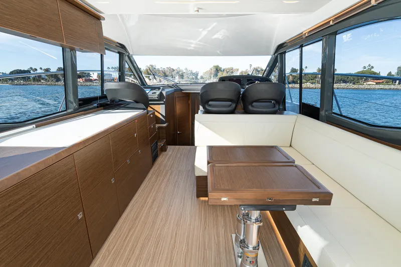 Slide: The Image of Luxurious interior of 2024 Bavaria R40 yacht with modern seating and panoramic windows. - 45