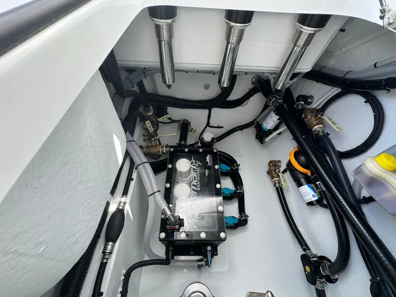 Slide: The Image of Engine compartment of 2024 Freeman 28 boat, showcasing wiring and components. - 15