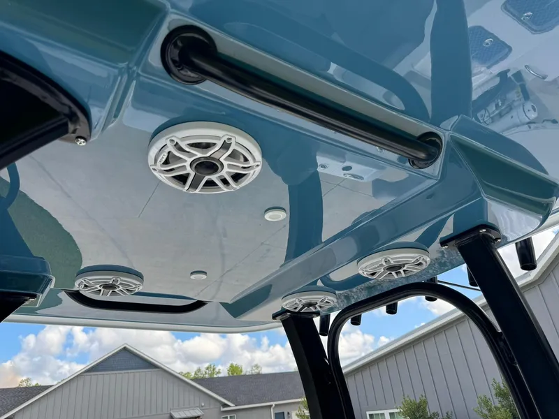 Slide: The Image of 2024 Freeman 28 boat speakers and roof detail against a clear sky. - 34