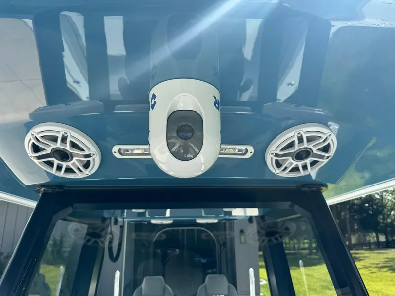 Slide: The Image of 2024 Freeman 28 boat interior with speakers and camera on ceiling. - 40