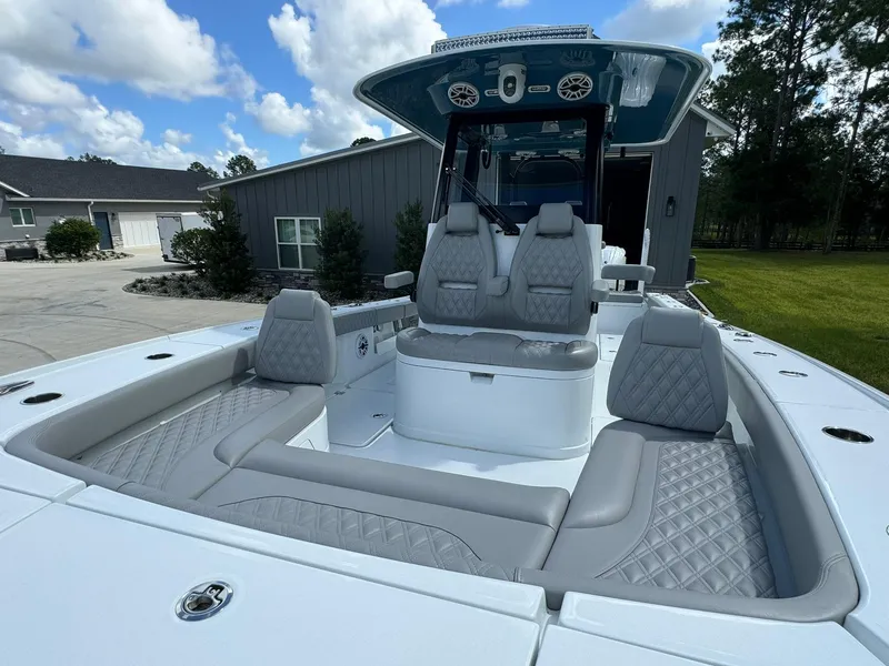 Slide: The Image of 2024 Freeman 28 boat with luxurious seating and modern design. - 42