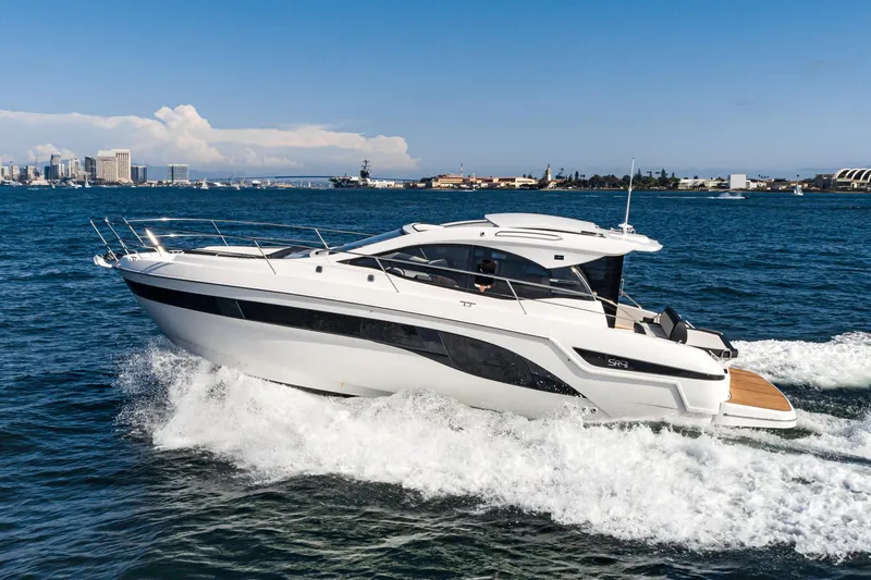 Slide: The Image of 2024 Bavaria SR41 yacht cruising on open water, showcasing sleek design and luxury features. - 10