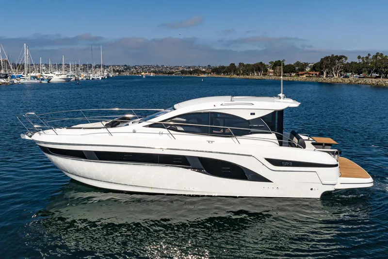 Slide: The Image of 2024 Bavaria SR41 yacht on calm water, showcasing sleek design and modern features. - 12