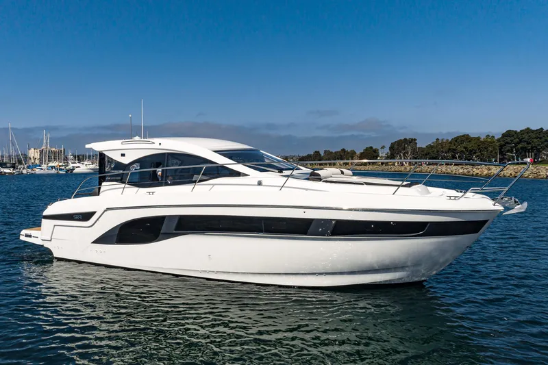 Slide: The Image of 2024 Bavaria SR41 yacht on calm water, showcasing sleek design and modern features. - 16