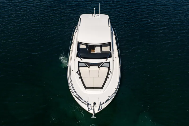 Slide: The Image of 2024 Bavaria SR41 yacht on calm water, aerial view. - 19