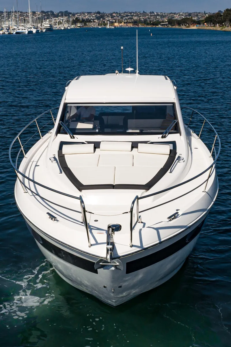 Slide: The Image of 2024 Bavaria SR41 yacht cruising on clear blue water. - 20