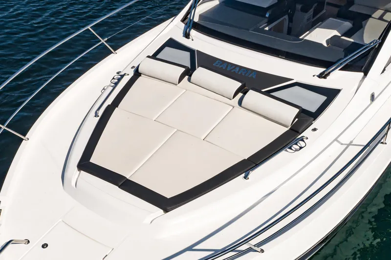 Slide: The Image of 2024 Bavaria SR41 yacht with spacious sunbathing deck on calm water. - 21