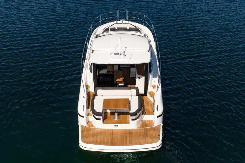 Slide: The Image of 2024 Bavaria SR41 yacht on open water, showcasing sleek design and spacious deck. - 29