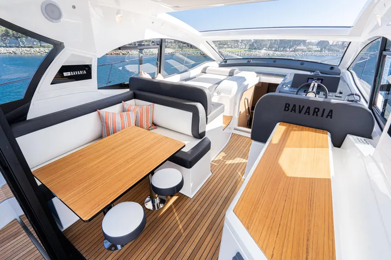 Slide: The Image of Luxurious interior of 2024 Bavaria SR41 yacht with modern seating and wooden accents. - 35
