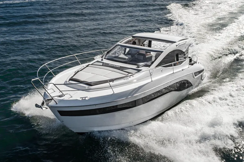 Slide: The Image of 2024 Bavaria SR41 yacht cruising on open water, showcasing sleek design and performance. - 4