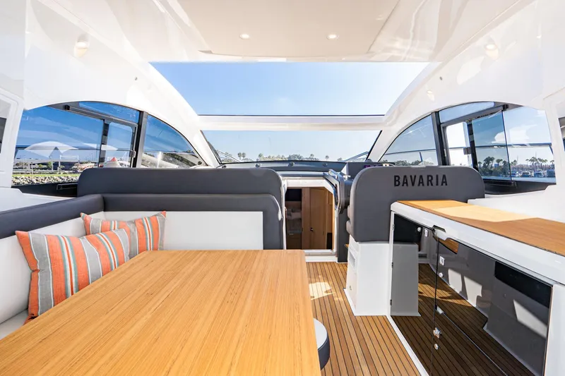 Slide: The Image of Luxurious interior of 2024 Bavaria SR41 yacht with modern seating and wooden accents. - 44