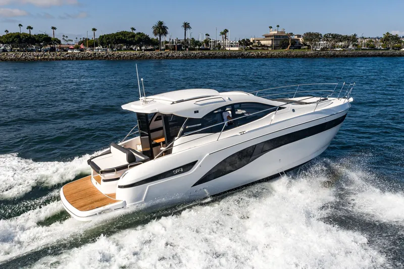 Slide: The Image of 2024 Bavaria SR41 yacht cruising on open water, showcasing sleek design and luxury features. - 7