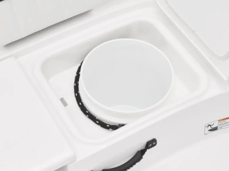 Slide: The Image of 2025 Yamaha Boats 195 FSH Sport storage compartment with integrated bucket. - 4