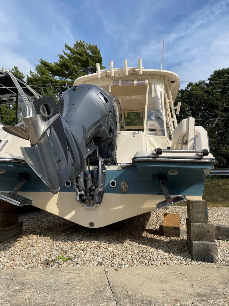 Slide: The Image of 2019 Grady-White 235 Freedom boat with outboard motor on dry dock. - 3